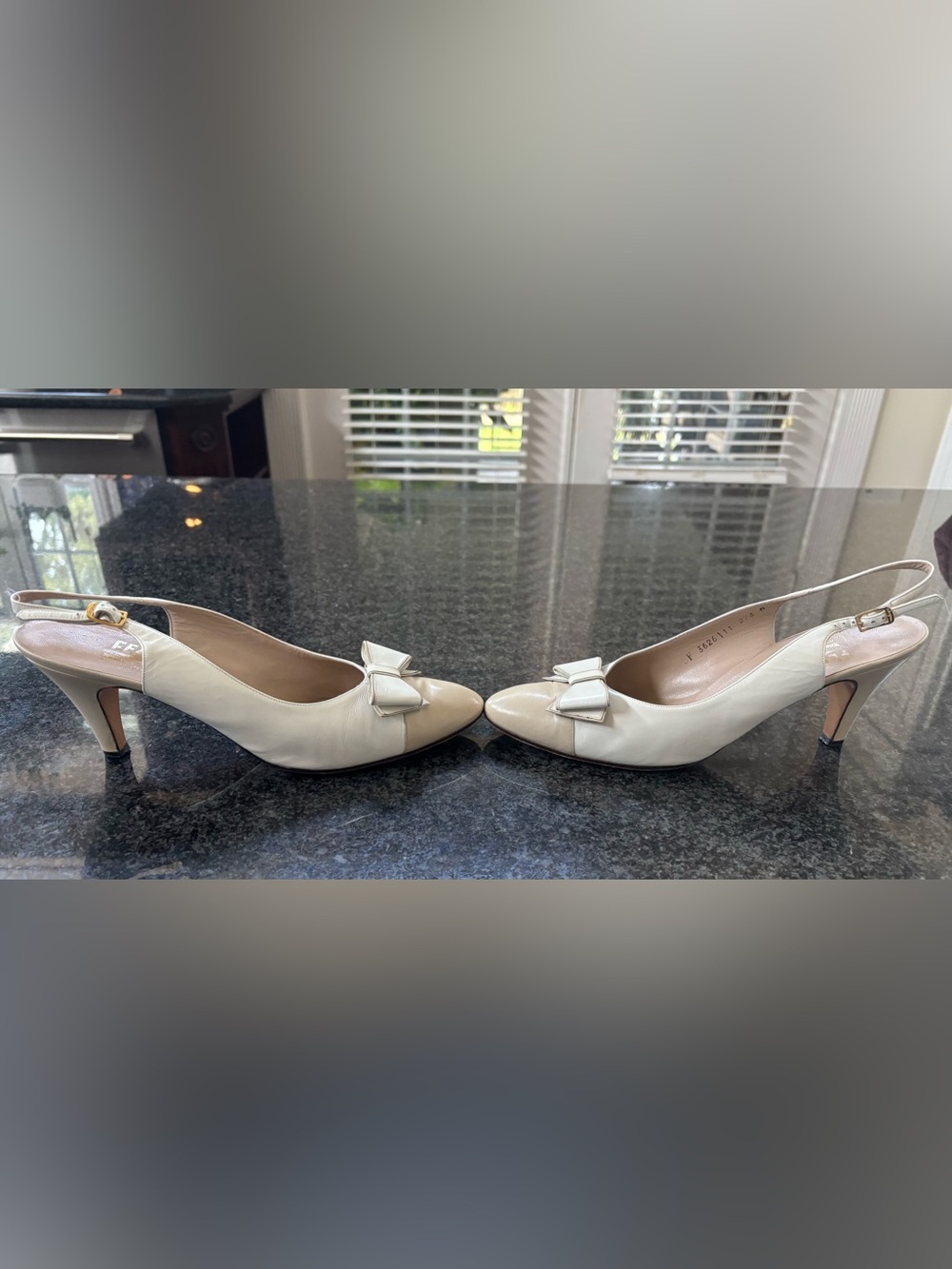 Classic Salvatore Ferragamo Ivory Slingback Pumps with Bow Accent